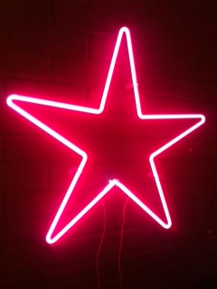 a red neon sign with a star on it