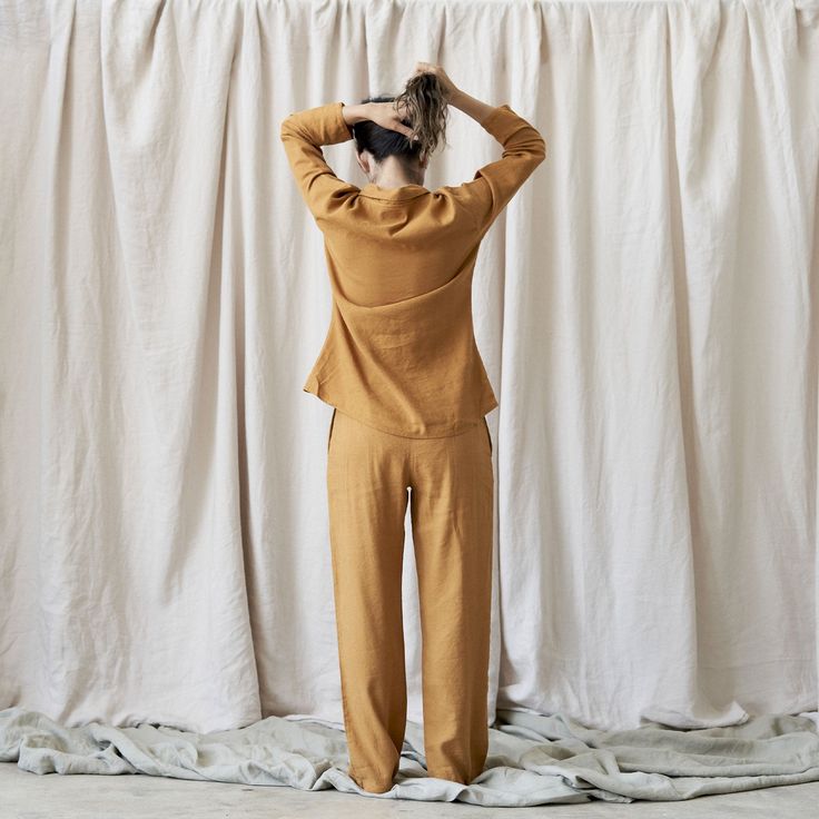 Our solid colored sleepwear collection is made from our heirloom linen blended with bamboo derived rayon for extra drape and softness. The Beni Pant is a high rise relaxed fit straight leg with a soft elastic waistband and hidden side seam pockets. Linen Pants For Lounging, Linen Lounging Pants, Relaxed Fit Viscose Pants For Loungewear, Beige Linen Pants For Loungewear, Comfortable Linen Lounge Pants, Comfortable Linen Loungewear Pants, Fall Linen Loungewear Bottoms, Comfortable Linen Pants For Loungewear, Flax Wide Leg Pants For Loungewear