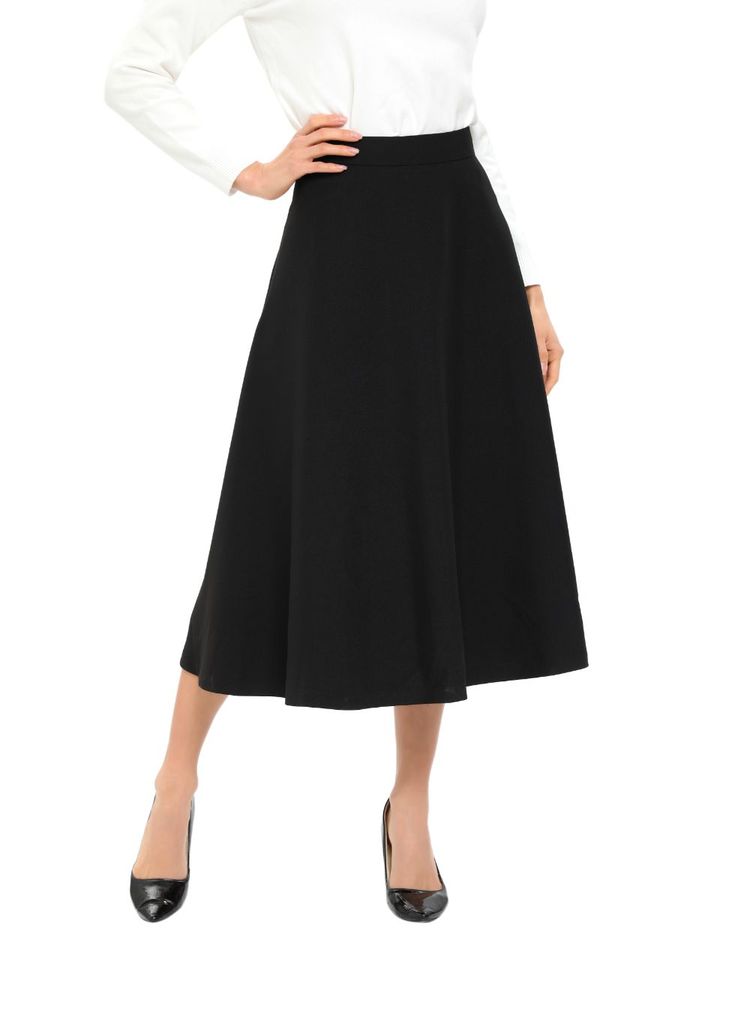 This classic black knee-length skirt is the perfect addition to any wardrobe. Its simple and timeless design makes it versatile and easy to wear for any occasion. The skirt falls at the knee, making it an appropriate and modest length. The A-line cut of the skirt creates a flattering silhouette and comfortable fit. It is made with a lightweight and breathable fabric that will keep you cool and comfortable all day long. It is available in sizes XS to XL, and with a length of 31 inches, it can acc A Line Cut, Black Knees, Fall Skirts, Knee Length Skirt, Keep Your Cool, Modest Outfits, Timeless Classic, Classic Black, The Knee