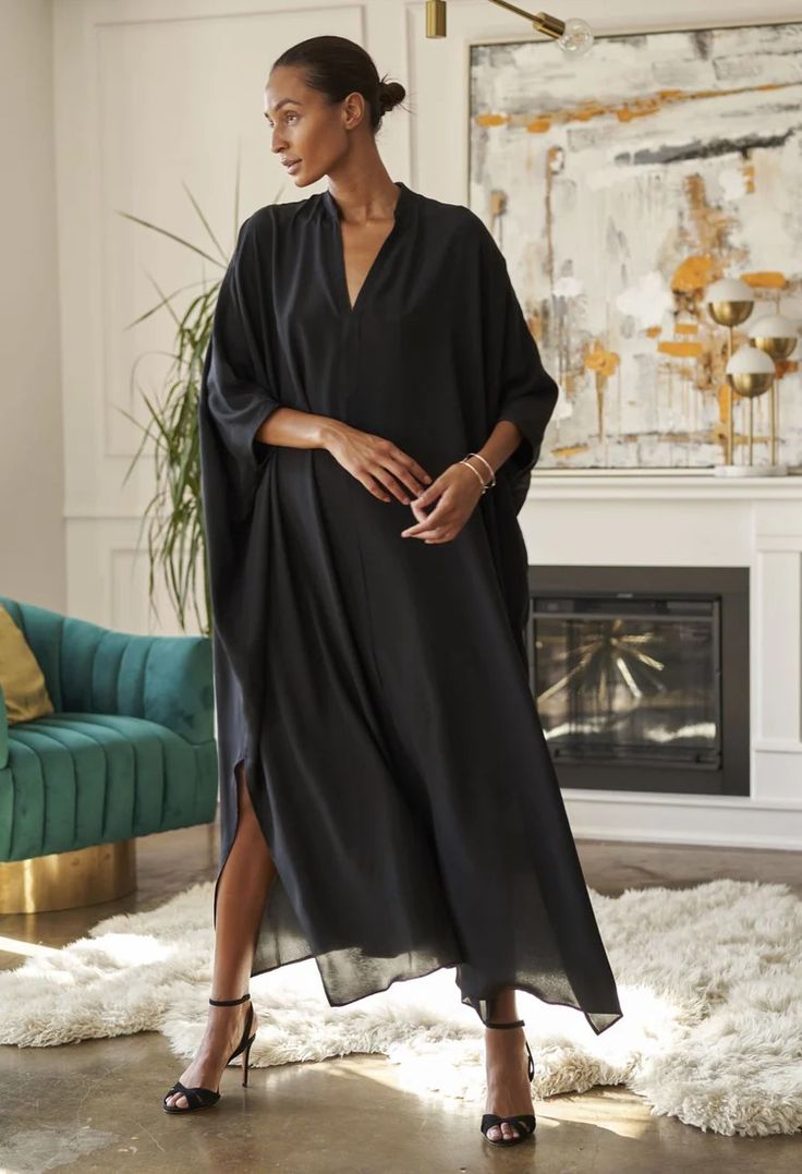 Talitha Silk Caftan - Long Caftan Dress for Women – ocean+main Chic Tunic Maxi Dress For Loungewear, Chic Long Sleeve Kaftan With Relaxed Fit, Chic Long-sleeved Kaftan With Relaxed Fit, Chic Long Sleeve Relaxed Fit Kaftan, Chic Oversized Kaftan For Beach Cover-up, Elegant Maxi Length Kaftan For Loungewear, Black V-neck Kaftan For Loungewear, Chic Maxi Length Kaftan For Loungewear, Chic Maxi-length Kaftan For Loungewear