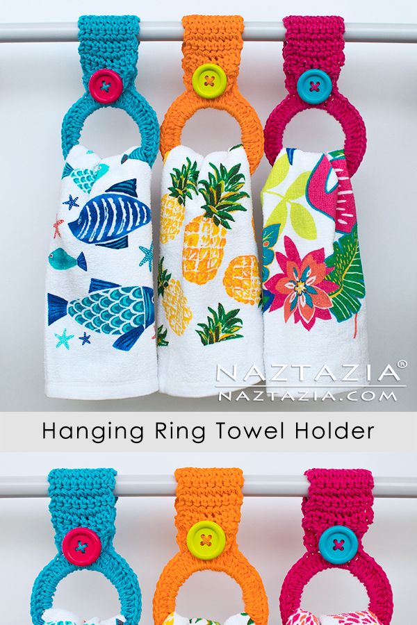 four colorful towels hanging on a rack with buttons and rings attached to the towel holders