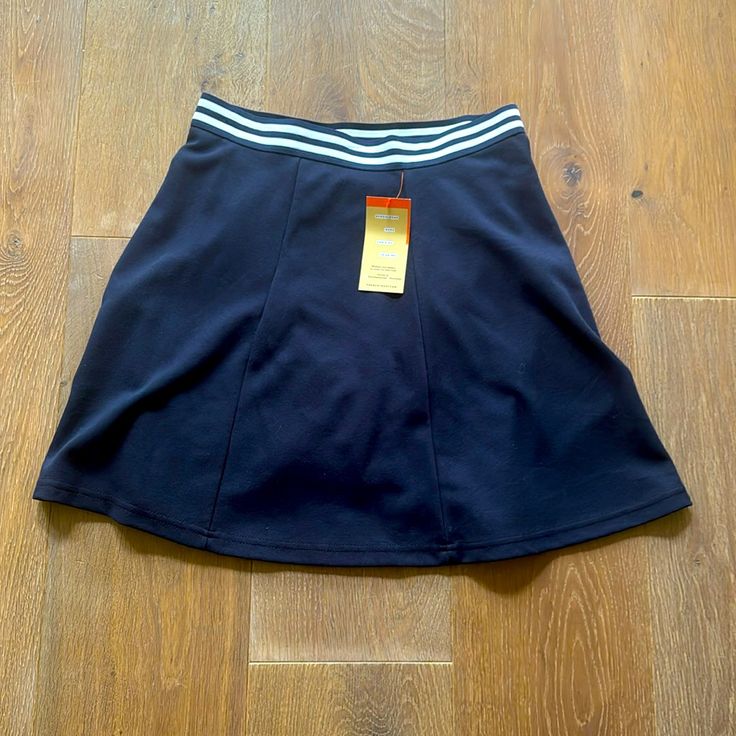 Nwt Elastic Waist Navy With Striped Waist Band User Shorts Built In Perfect For School Uniform Casual Stretch Skort For School, Navy Stretch Casual Skort, Stretch Short Length Bottoms For School, Stretch Lined Skirt Bottoms For School, Stretch Lined Skirt For School, Navy Casual Skort Short Length, Blue Elastane Casual Skirt, Casual Blue Elastane Skirt, Navy Casual Short Length Skort