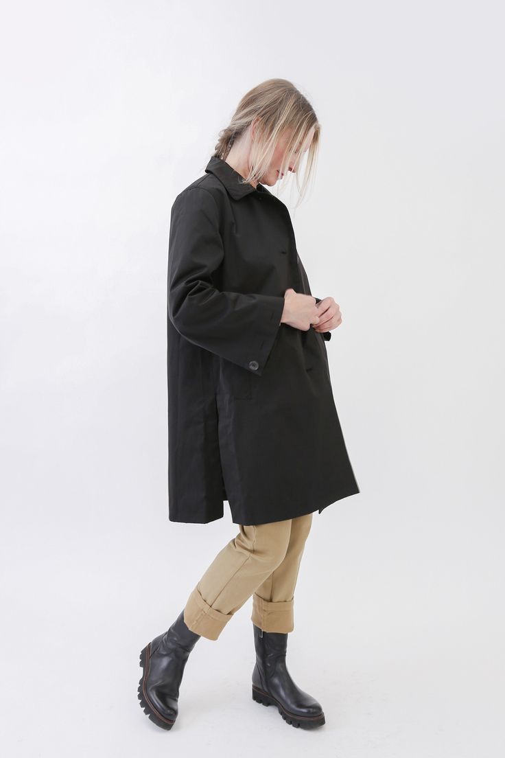 BEST-SELLING WATERPROOF Renewed take on the classic trench. The Travel Trench is a water-repellant packable elegant style for everyday, every-weather wear. Made in soft, water-repellent fabric, enjoy the gorgeous meticulous fit, yet easy-wear, unadorned nature of this collared and flattering a-line design. Find your perfect fit with the size guide below. Features a turn-up classic collar, fold-over cuff for a fitted sleeve option, pockets, lining, dramatic side vents, and a front button closure Elegant Solid Color Fall Raincoat, Classic Long Raincoat For Fall, Waterproof Outerwear For Rainy Season Workwear, Classic Outerwear For Rainy Season, Solid Gabardine Raincoat For Workwear, Solid Weatherproof Outerwear For Workwear, Solid Color Weatherproof Outerwear For Workwear, Solid Weatherproof Outerwear For Work, Elegant Solid Raincoat For Work