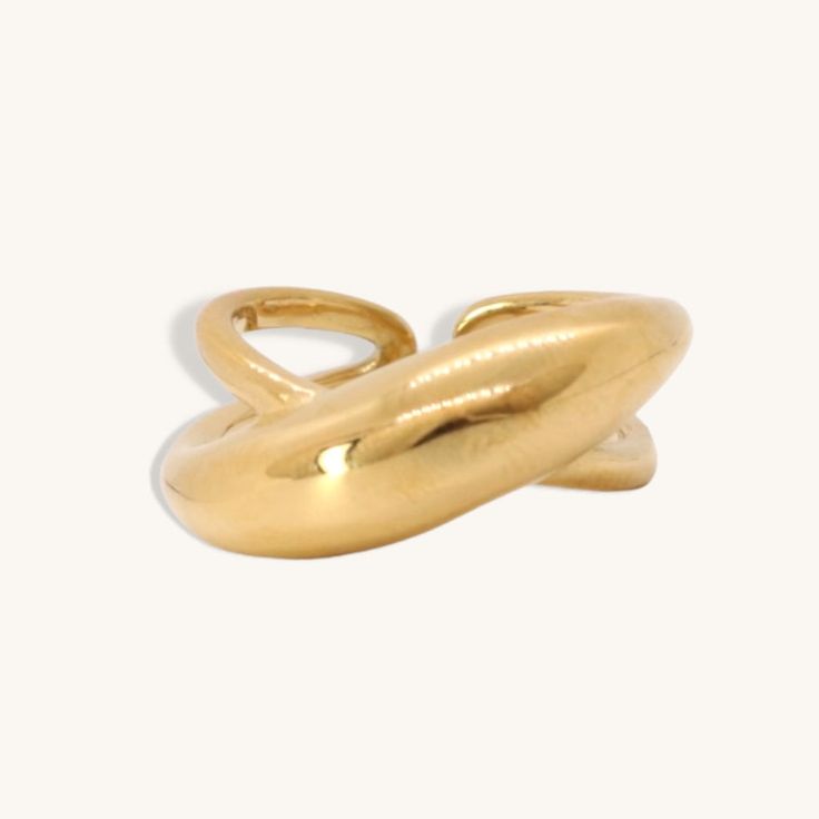 This gold ring has a unique and beautiful shape, made of stainless steel and gold. - gold filled- stainless steel and gold- non-tarnishing- Style: Minimalist Gold Bypass Ring With Modern Twist, Matte Gold Brass Rings As Gifts, Matte Gold Brass Rings For Gift, Modern Gold-tone Jewelry With Metal Ring, Modern Thick Band Gold Plated Jewelry, Gold Dome Ring With Polished Finish Open Band, Gold-tone Polished Finish Rings, Gold-tone Gold-plated Jewelry With Ring Detail, Modern Gold Plated Thick Band Jewelry