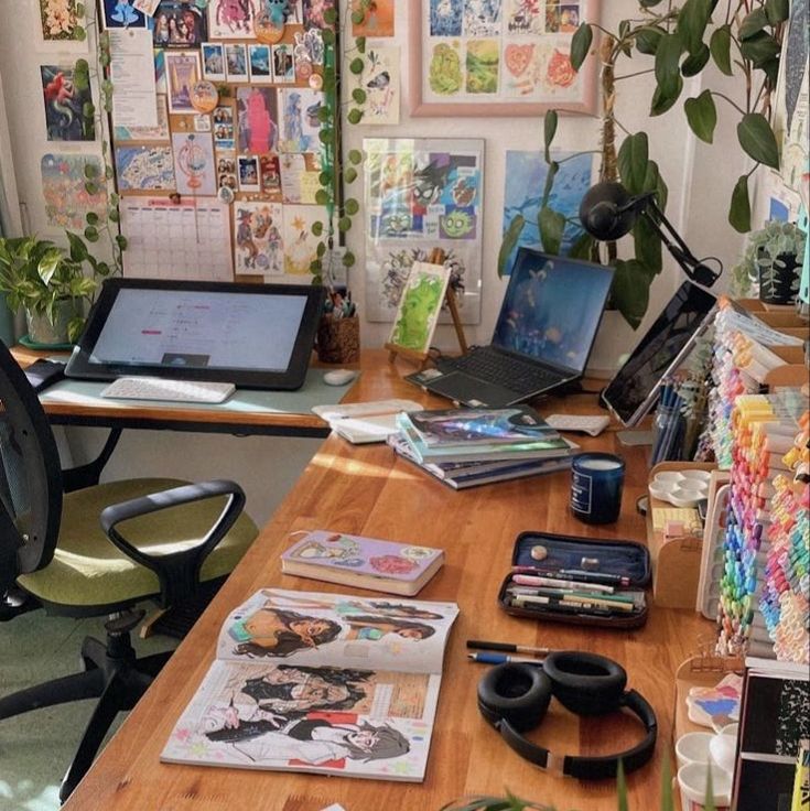 a wooden desk topped with lots of office supplies