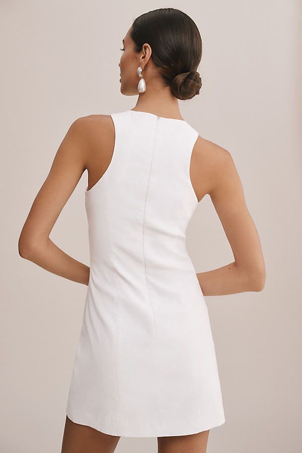 Polished and poised, the BHLDN Helena Mini Dress presents a sleeveless, form-fitting silhouette that subtly flares at the skirt. The meticulous seam detailing and chic halter-style neckline deliver the perfect finishing touch. Magic Fabric It’s no illusion: This only-at-Anthro fabric is expertly engineered to sculpt as it stretches. It’s quite the trick, and it’s wowing everybody – just check out the reviews! Try it on for yourself – because when the ta-da is how incredibly it fits and flatters, Fitted A-line Halter Dress For Date Night, Elegant Sleeveless Dress With Flattering Silhouette For Date Night, Elegant Sleeveless Dress With Flattering Silhouette For Summer, Chic A-line Dress With Keyhole Back, Fitted A-line Dress With Keyhole Back, Elegant White Dress With Keyhole Back, Chic White Sleeveless Dress With Fitted Bodice, Chic Sleeveless Dress With Fitted Bodice For Cocktail, Sleeveless Bodycon Dress With Fitted Bodice For Cocktail