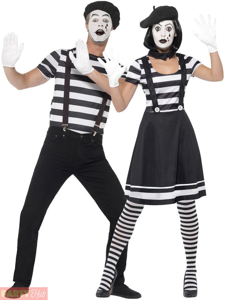 two people dressed as mime and mime clowns are posing for the camera