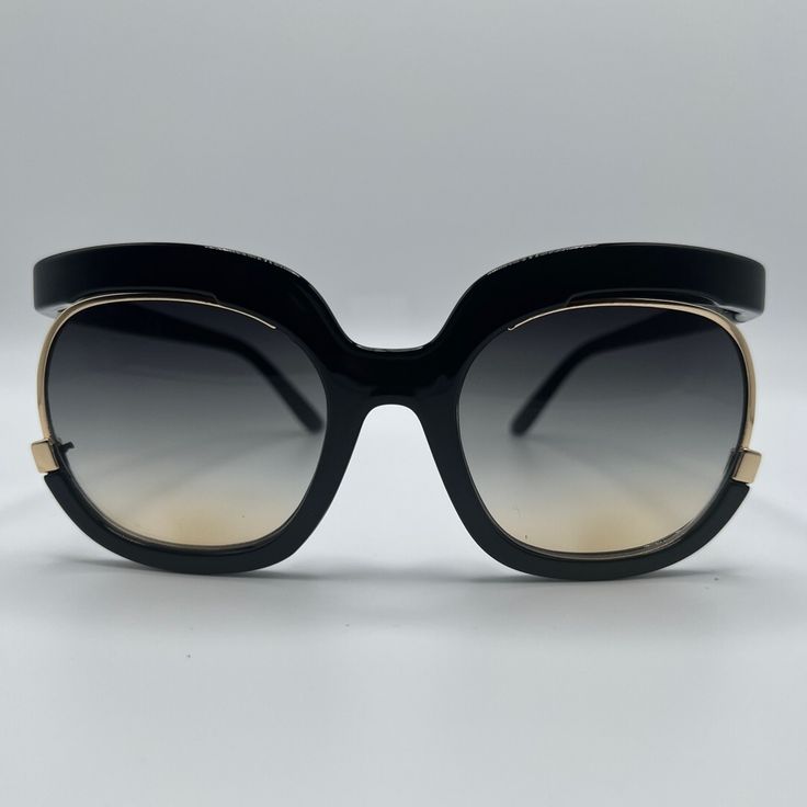 Black Sunglasses With Round Gold Framed Lens. Matte Black Sunglasses With Gradient Lenses For Party, Casual Evening Sunglasses With Glass Lenses, Black Sunglasses With Tinted Glass Lenses, Black Sunglasses With Gradient Glass Lenses, Black Tinted Lens Sunglasses With Glass Material, Black Sunglasses With Uva Protection, Black Glass Sunglasses For Spring, Chic Black Sunglasses With Glass Lenses, Black Glass Sunglasses For The Beach