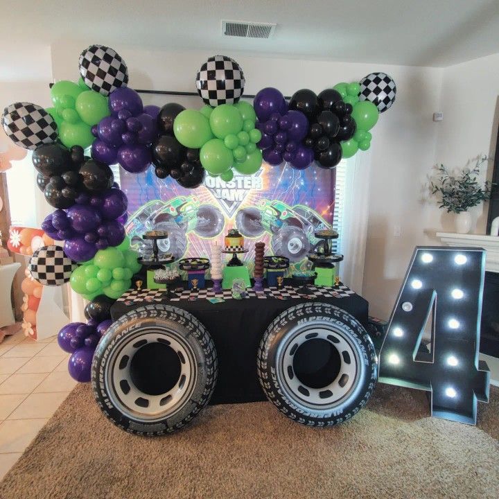 a birthday party setup with balloons and decorations