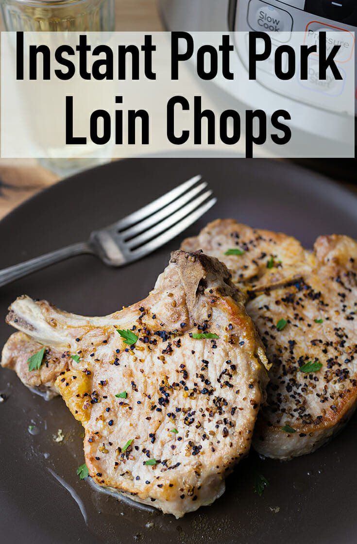 two cooked pork chops on a black plate with the title instant pot pork loin chops