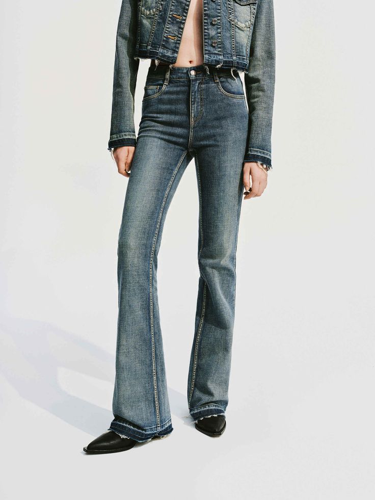 MO&Co. Women's Straight Leg Vintage Jeans Crafted from premium Turkish cotton, these jeans feature a slight stretch and mid-rise cut for a flattering fit. The vintage-inspired flared silhouette and raw edge detailing add a touch of sophistication to any outfit. Wear it with a coordinating denim jacket. Features : - Slightly vintage flared silhouette- Zip fly, five pocket design- Fringed details on the bottom Code: MBD1JEN003The back length of size M/27 is 108cmMATERIALS & CARE Material: 98.7% Co Jean Crafts, Vintage Flare, Denim Flares, Vintage Jeans, Raw Edge, Pocket Design, Flare Jeans, Dress Collection, Mid Rise