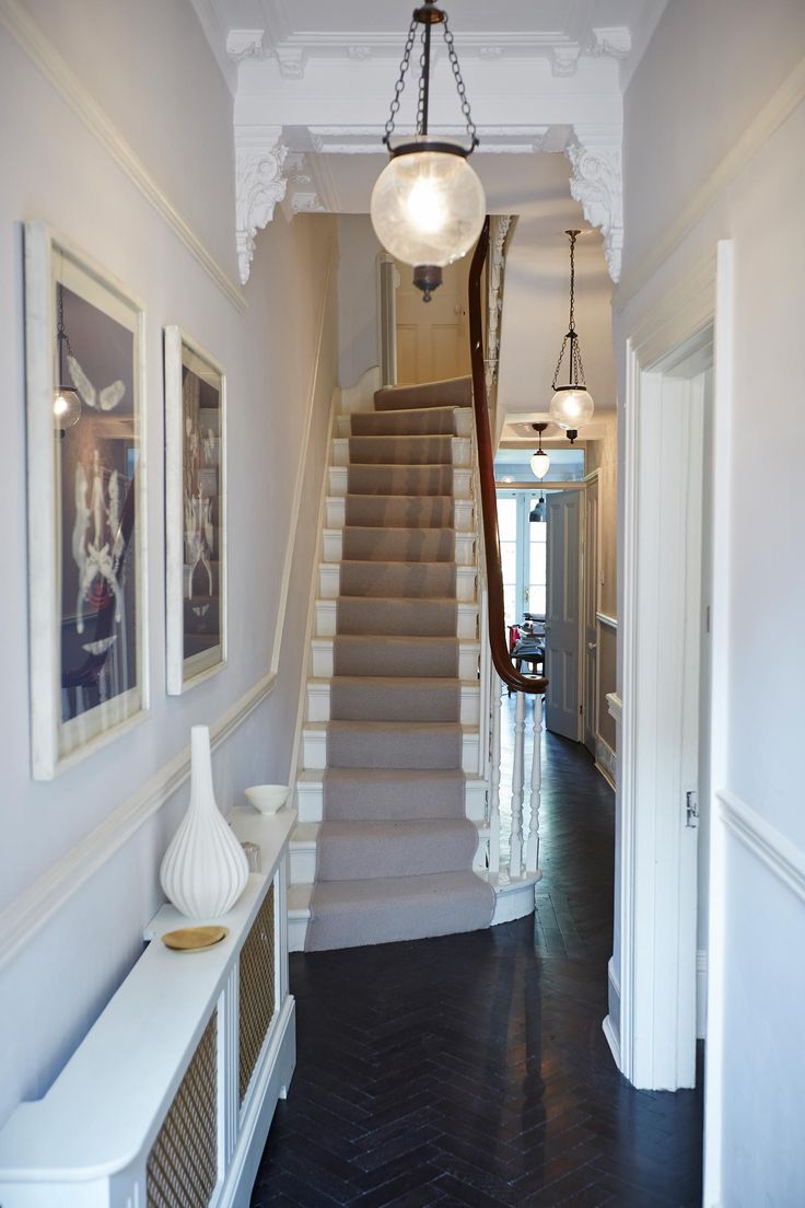 the hallway is clean and ready for us to use as an entrance way in this house