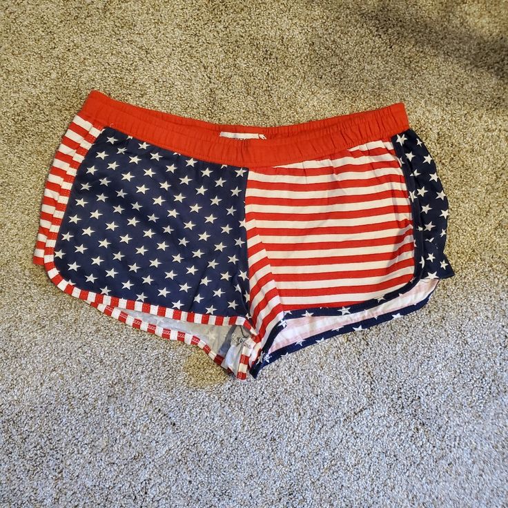 Nwot! These American Flag Shorts Have Never Been Worn. The Label Says Large But Fits Like A Small. Go Usa! Blue Bottoms For Beach On 4th Of July, Red Stretch Bottoms For 4th Of July, American Flag Print Bottoms For 4th Of July Beach, Patriotic Summer Vacation Bottoms, Blue Shorts For Beach And 4th Of July, 4th Of July Vacation Flag Print Bottoms, American Flag Print Bottoms For Beach Season, Casual Flag Print Bottoms For Beach, Casual Red Flag Print Bottoms