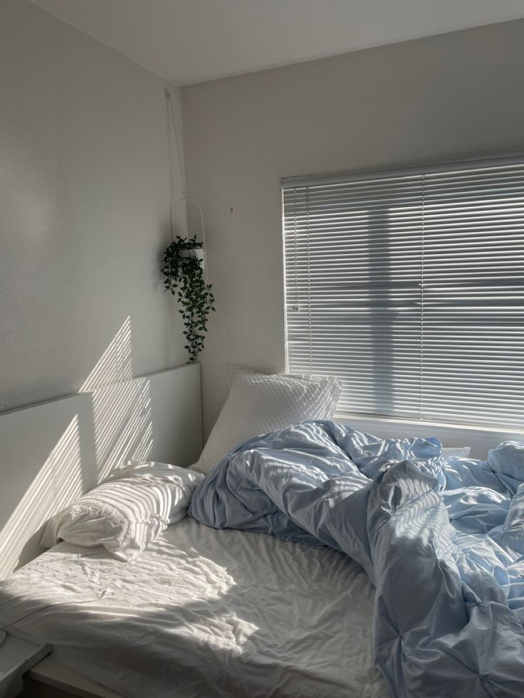 Bed
Room decor
Light blue duvet 
White sheets
Hanging plant
Plant decor 
Morning
Simple
Minimal
Minimalistic 
White bed frame
Ikea bed Light Blue Room Decor, Grunge Bedrooms, Light Blue Room, Bedrooms Simple, Blue Themed Bedroom, Light Blue Rooms, Design Room Ideas, Aesthetic Bedrooms, Light Blue Bedroom