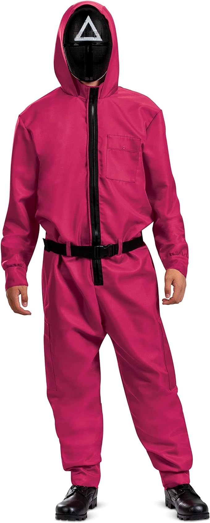 a man in a pink suit with a black mask on his face and hands behind his back