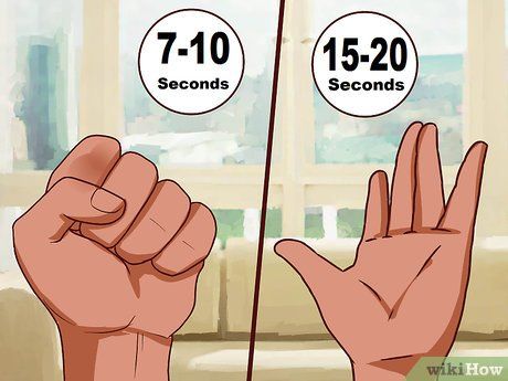 two hands are shown with the same amount of time each hand is held up in front of an open window