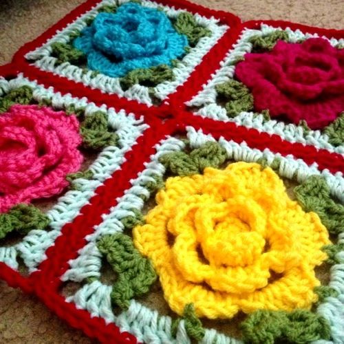 crocheted squares with flowers on them are shown in three different colors and sizes