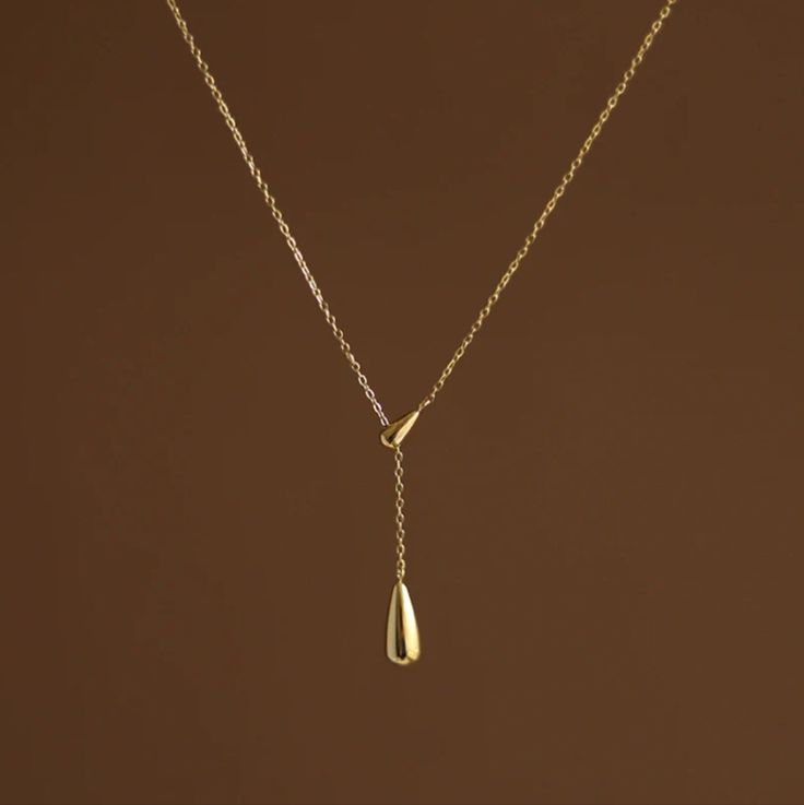 18k Gold Plated Hypoallergenic Stainless Steel Tarnish-Free Minimalist 14k Gold Drop Necklace For Formal Occasions, Luxury Teardrop Gold Chain Jewelry Gift, Elegant Everyday Drop Necklace With Clavicle Chain, Elegant Drop Necklace With Adjustable Chain For Everyday, Elegant Everyday Drop Necklace With Adjustable Chain, Modern Yellow Gold Drop Jewelry, Gold Plated Teardrop Drop Necklace, Gold Plated Teardrop Necklace, Gold Drop Necklace With Clavicle Chain And Teardrop Pendant