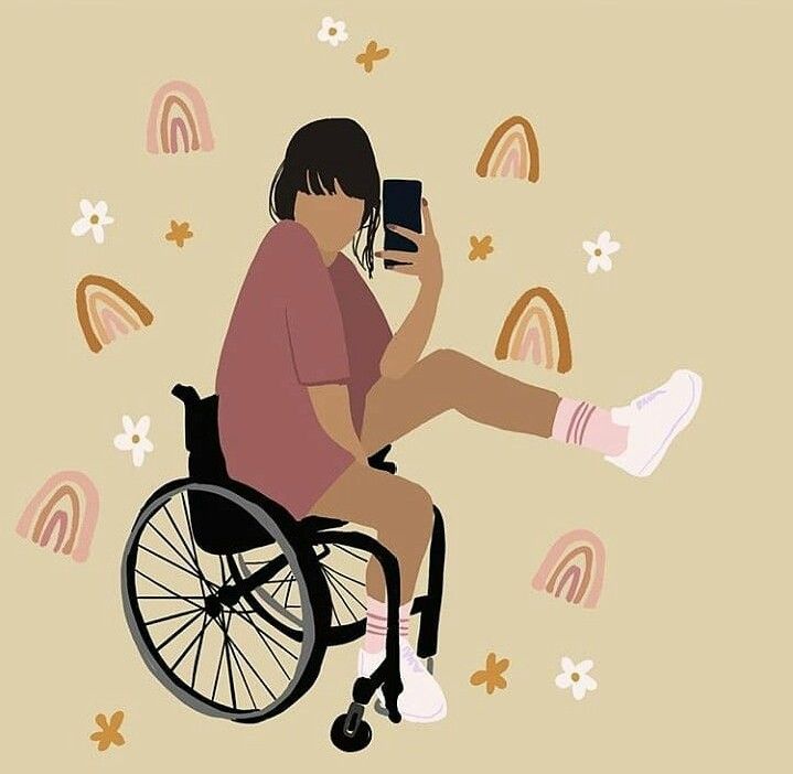 a woman sitting in a wheel chair holding a cell phone