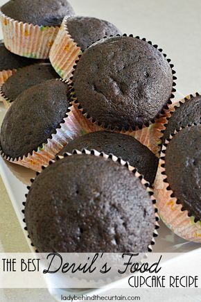 several chocolate muffins on a white plate with the words, the best devil's food cupcake recipe