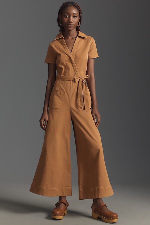 71% cotton, 26% Tencel, 3% elastane Cropped inseam Front and back patch pockets Belted styling Back zip Machine wash Imported | Wrapped Culotte Jumpsuit by Maeve in Beige, Women's, Size: 10, Cotton/Elastane/Tencel at Anthropologie Chic Cotton Jumpsuits And Rompers For Work, Chic Cotton Jumpsuits For Work, Fitted Cotton Jumpsuits And Rompers With Pockets, Cotton Fitted Jumpsuits And Rompers With Pockets, Cotton Jumpsuits And Rompers With Pockets For Work, Cotton Workwear Jumpsuits And Rompers With Pockets, Cotton Short Sleeve Jumpsuits And Rompers For Fall, Short Sleeve Cotton Jumpsuits And Rompers For Fall, Cotton V-neck Jumpsuit For Work