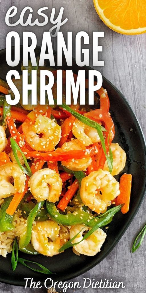 an easy orange shrimp recipe on a black plate