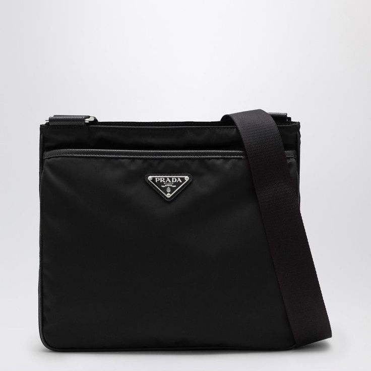 Black Recycled Nylon Messenger Bag From Prada Featuring Saffiano-Print Leather Trim, Top Zip Fastening, Flat Front Pocket, Inside Zip Pocket, Adjustable Shoulder Strap, And Silver-Tone Metal Hardware. Width 28 Cm X Height 25 Cm X Depth 6 Cm Adjustable Shoulder Strap Length Min 84 Cm - Max 124 Cm Size Type: Int Material: Nylon Sku: 2f-2vh118xoo2dmh/P_prada-F0002_100 Welcome To The Official Luosophy Poshmark Closet! Luosophy Is A Luxury Brand Reselling Company Founded In San Diego, Ca From 2016. A Designer Nylon Bag For Formal Occasions, Designer Formal Nylon Bag, Classic Formal Nylon Shoulder Bag, Designer Black Nylon Bag, Black Designer Nylon Bag, Prada Pochette, Leather Business Bag, Skull Wallet, Prada Nylon