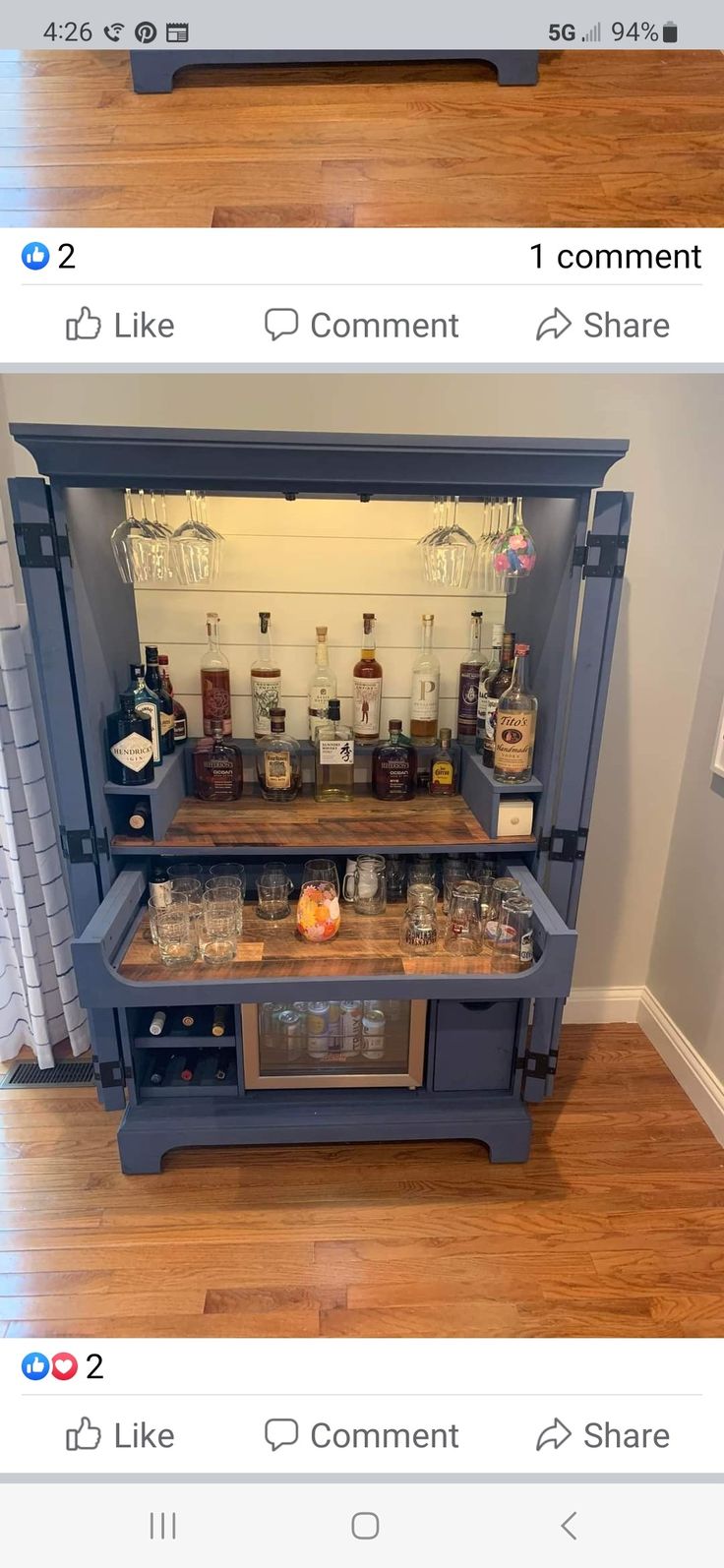 an old cabinet turned into a bar with shelves for bottles and jars on top, then built into the wall