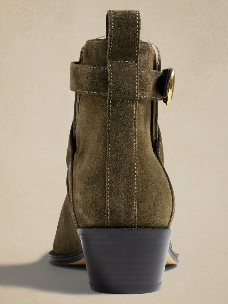 Rugged style with luxurious texture, our signature suede ankle boots are crafted in Italy from sturdy, soft suede so they'll stretch and soften to your feet, creating a truly custom fit.  Italian suede uppers, leather lining, and leather soles.  Stacked heel.  Buckle closure, interior elastic under the tongue of the boot.  Made in Italy.  B Width.  Heel height: 2" (5cm) Suede Chelsea Boots With Leather Sole Medium Width, Fall Suede Moto Boots With Leather Lining, Suede Chelsea Boots With Heel Pull Tab, Chic Suede Chelsea Boots For Winter, Chic Winter Suede Chelsea Boots, Fall Suede Moto Boots Medium Width, Winter Suede Heeled Boots With Suede Lining, Winter Suede Moto Boots With Leather Footbed, Suede Chelsea Boots With Suede Lining For Work