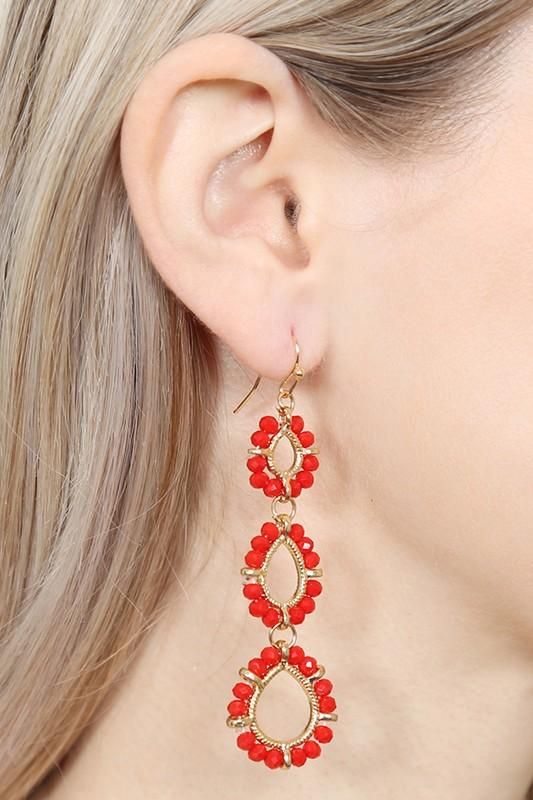 Teardrop Dangle Earrings - Jolie Vaughan | Online Clothing Boutique near Baton Rouge, LA Single Teardrop Beaded Earring For Party, Trendy Beaded Chandelier Earrings, Colorful Beaded Dangle Teardrop Earrings, Long Drop Teardrop Earrings With Dangling Beads, Beaded Teardrop Dangle Earrings, Trendy Teardrop Dangling Bead Jewelry, Trendy Teardrop Beaded Earrings With Ear Wire, Red Teardrop Earrings With Dangling Beads, Teardrop Earrings With Round Beads