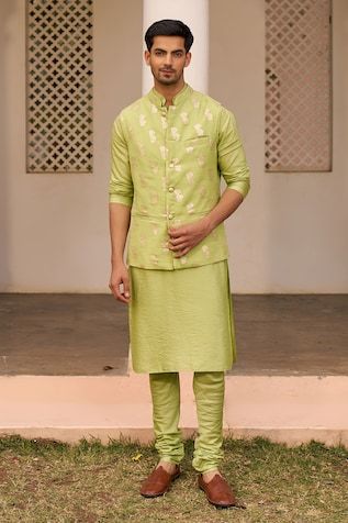 Pista green sleeveless banarasi bundi with blossom motif woven details. Paired with a three fourth sleeves solid kurta and a straight pant. - Aza Fashions Designer Green Chanderi Nehru Jacket, Green Chanderi Nehru Jacket For Transitional Season, Transitional Green Chanderi Nehru Jacket, Green Chanderi Nehru Jacket With Zari Work, Fitted Green Chanderi Bandhgala, Fitted Green Bandhgala In Chanderi, Green Chanderi Nehru Jacket For Wedding, Festive Green Chanderi Nehru Jacket, Green Chanderi Nehru Jacket For Festivals