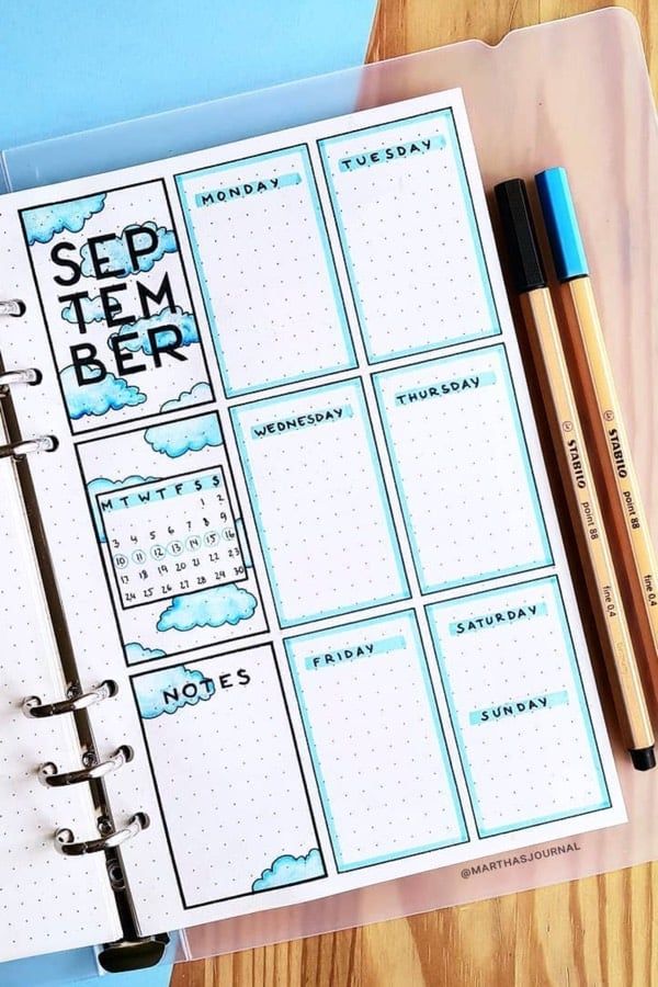 a planner with the words seedtember written on it and two pencils next to it