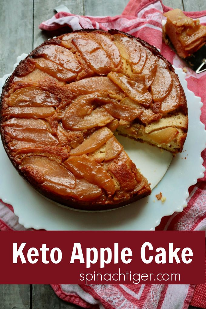 a close up of a cake on a plate with the words keto apple cake