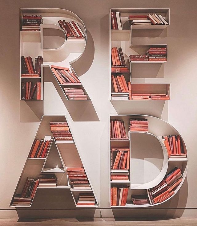 the letters are made out of books on display