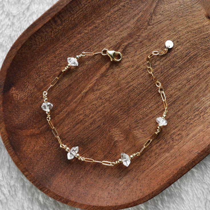 "Herkimer diamonds" bracelet. ✔️ Choose material ✔️ Choose bracelet length All bracelets have an extra 1 1/4 inches extender. 🔸 14k gold filled or Sterling Silver purity .925 🔸Tarnish resistant 🔸Handmade Number of stones vary depending of the bracelet size.  If you don't see your size please message me! Herkimer are natural crystals that are called  "diamonds" due to their shape and gorgeous look. They are natural stones which makes each one special and there is a natural variance in shape on Dainty Crystal Jewelry, Gold Crystal Bracelet With Faceted Details, Elegant Herkimer Diamond Jewelry For Gifts, Faceted 14k Gold Filled Jewelry For Wedding, Elegant Faceted Herkimer Diamond Jewelry, Dainty Gold Crystal Bracelet For Anniversary, Everyday Gold Crystal Jewelry, Crystal Faceted Bracelets For Weddings, Gold Cubic Zirconia Crystal Bracelet In Dainty Style