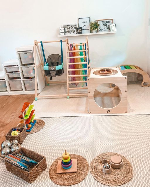 a child's play room with toys on the floor