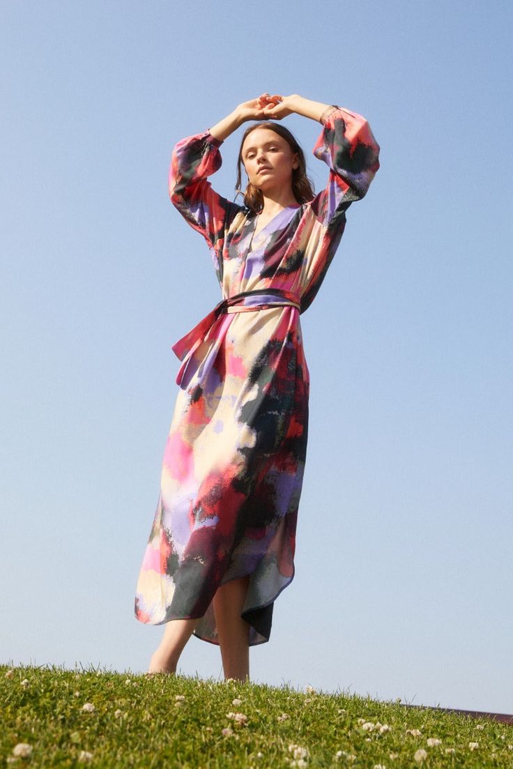 Introducing the epitome of springtime elegance: the Satin Tencel Sunita Maxi Dress, now available in our enchanting new spring prints. Inspired by pastel abstract art and jewel tones, these dreamy prints evoke a sense of whimsy and sophistication.Crafted with care and attention to detail, the Sunita Maxi Dress features a timeless v-neckline and long sleeves, creating a look that's both graceful and refined. Its flowing silhouette drapes beautifully, flattering women of all sizes and shapes.Each Multicolor Printed Silk Midi Dress, Multicolor Silk Midi Dress With Abstract Print, Multicolor Abstract Print Dress For Brunch, Spring Multicolor Abstract Print Maxi Dress, Spring Silk Midi Dress With Print, Elegant Multicolor Print Silk Dress, Elegant Multicolor Floral Print Maxi Dress, Spring Party Maxi Dress With Abstract Print, Elegant V-neck Dress With Digital Print