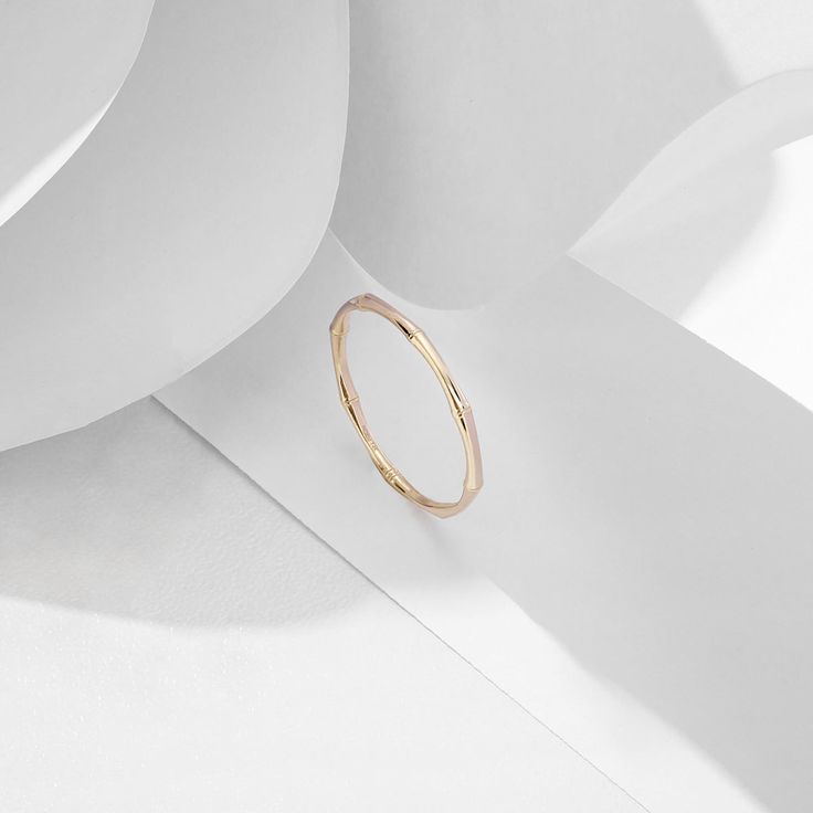 The Minimalist Bamboo Ring is a great integration natural and modern style. It is perfect for everyday wear and a wonderful gift for all kind of occasions. - Made in 14k solid gold- Band Width: 1.65mm / 0.06 inches- Thickness: 1.11 mm / 0.04 inches -This product comes with iconic Norm Jewels gift box Simple 14k Rose Gold Stackable Rings, Minimalist Yellow Gold Stackable Toe Rings, Minimalist Gold Midi Rings, Minimalist Yellow Gold Toe Stackable Rings, Minimalist Hypoallergenic Stackable Rings In Rose Gold, Minimalist Hypoallergenic Midi Rings With Round Band, Minimalist Hypoallergenic Stackable Rings With Open Band, Minimalist Hypoallergenic Rose Gold Stackable Rings, Minimalist Hypoallergenic Stackable Rose Gold Rings