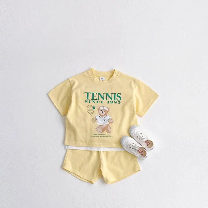 Get your little one ready to hit the court with the TENNIS Bear Tee & Shorts Set. 🎾 Made from comfortable cotton fabric, this casual set is perfect for summer days. The unisex design and range of sizes (1-6 years) ensure a perfect fit for every child. With its adorable cartoon pattern and regular sleeve style, your little tennis enthusiast will look stylish while staying comfortable. Whether they're playing or simply lounging around, this set is a must-have for any young tennis lover. Serve up some style and fun with the TENNIS Bear Tee & Shorts Set! 🐻👕✨ Specifications: Style: Casual Material: Cotton Fabric Type: Worsted Sleeve Length: Short Fit: Fits true to size, take your normal size Season: Summer Item Type: Set Age Range: 1-6 years Gender: Unisex Department Name: Baby Collar: O-Nec Cotton Sport Sets With Graphic Print, Cotton Graphic Print Sports Sets, Sporty Crew Neck Playwear Set, Casual Short Sleeve Playwear Set, Casual Cotton Short Set For Playwear, Cotton Graphic Print Playwear Sets, Cotton Playwear Sets With Graphic Print, Cotton Graphic Print Sets For Playwear, Sporty Graphic Print Playwear Set