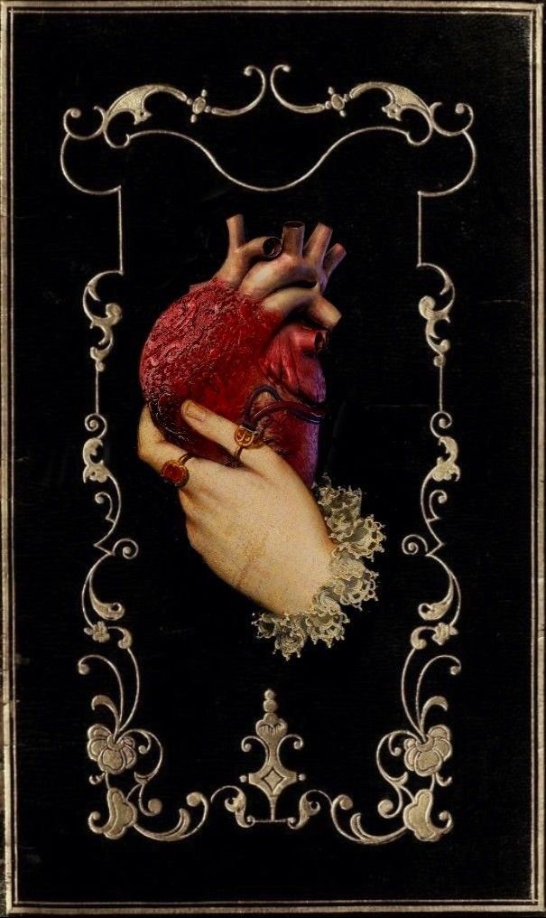 a hand holding a human heart with ornate border around the edges, on a black background