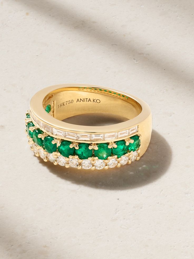 Anita Ko's ring is set with a row of emeralds sandwiched between baguette- and round-cut diamonds - it creates a cool stacked look without any effort. It's cast from 18-karat gold and looks especially chic against a bold red manicure. Timeless Green Jewelry With Baguette Diamonds, Luxury Emerald Ring In Yellow Gold With Baguette Diamonds, Luxury Yellow Gold Emerald Ring With Baguette Diamonds, Emerald Ring With Baguette Diamonds Fine Jewelry, Emerald Ring With Baguette Diamonds In Fine Jewelry Style, Elegant Emerald Ring In Yellow Gold With Baguette Diamonds, Elegant Emerald Ring With Baguette Diamonds, Elegant Emerald Ring With Baguette Diamonds In Yellow Gold, Elegant Yellow Gold Emerald Ring With Baguette Diamonds