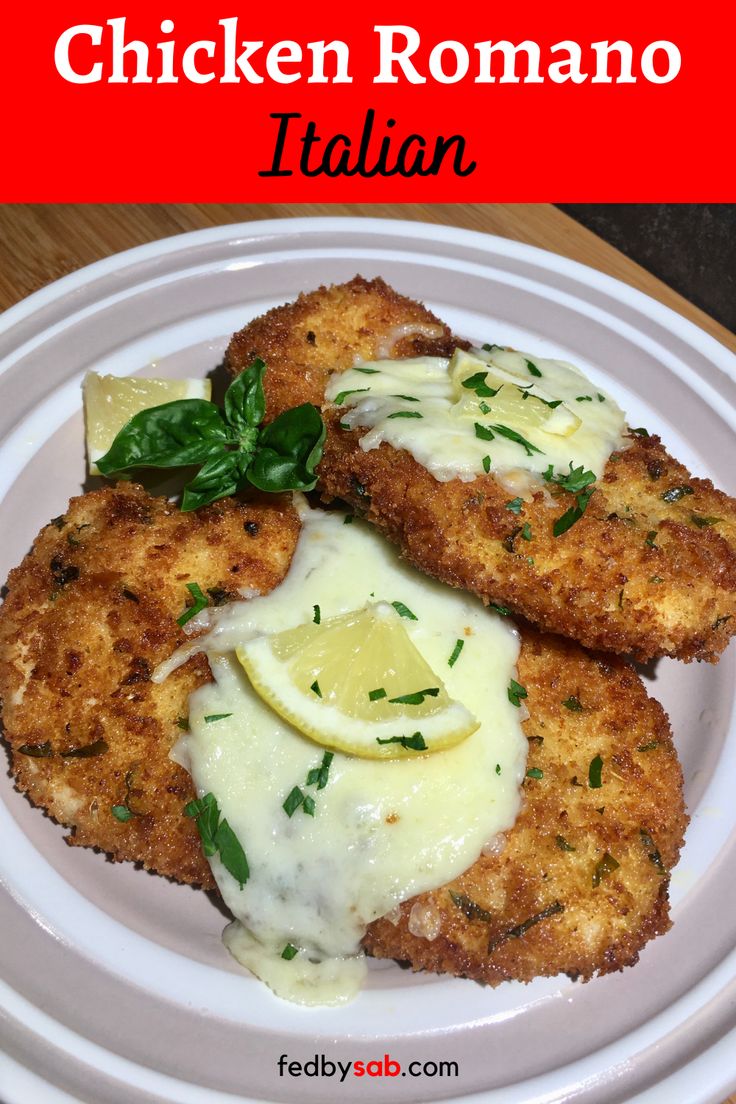 chicken romano with lemon sauce and parmesan cheese on the side, served on a white plate