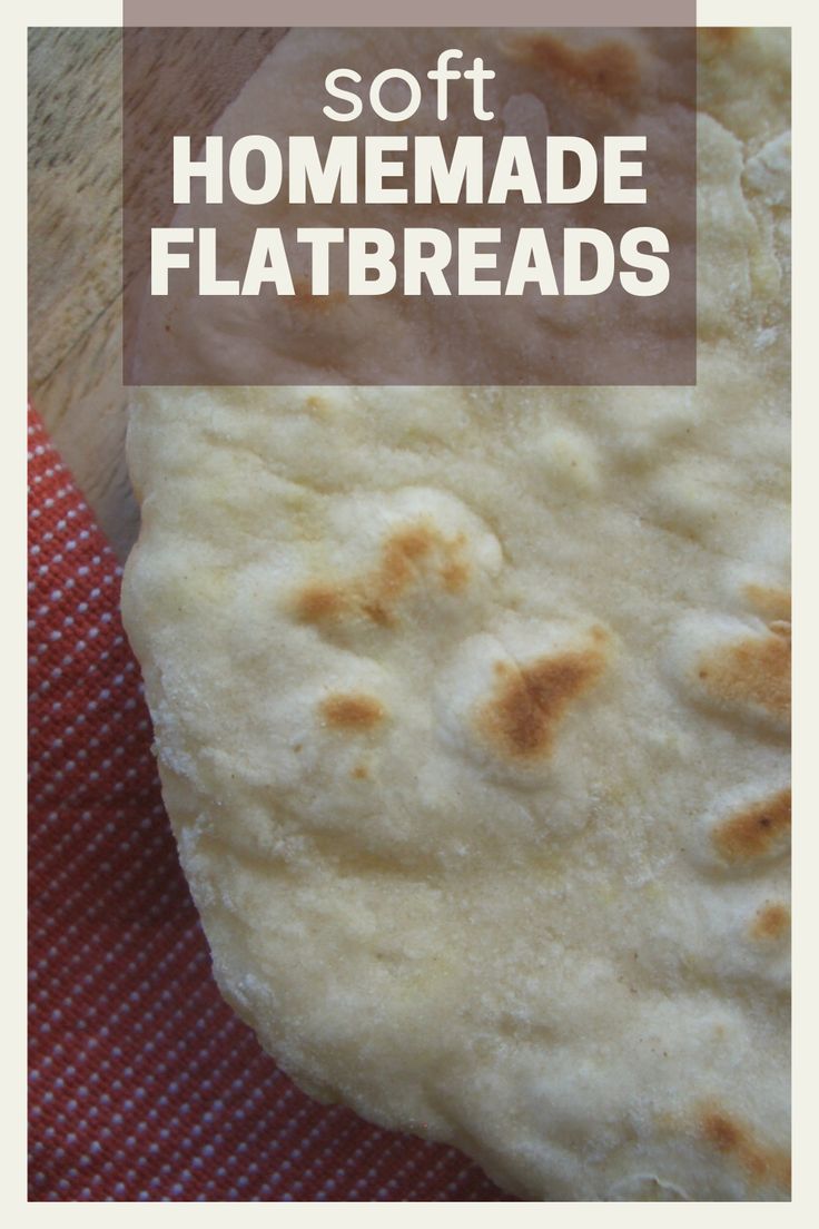 homemade flatbreads on a red and white checkered cloth with text overlay that reads soft homemade flatbreads