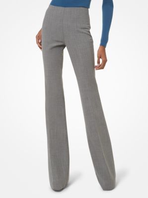 Defined by a sharp silhouette our Brooke pants will be a wardrobe mainstay for years to come. Tailored in Italy from stretch crepe this pair features a snug fit through the hips that lends dramatic contrast to its flared leg. Pair them with a sweater. Spring Wool Dress Pants For Workwear, Tailored Wool Pants For Spring, Chic Full-length Wool Bottoms, Chic Full Length Wool Bottoms, Spring Wool Straight Pants, Fitted Wool Wide Leg Pants For Fall, Fall Elastane Tapered Leg Dress Pants, Fitted Wool Wide-leg Pants, Fall Tapered Leg Elastane Dress Pants