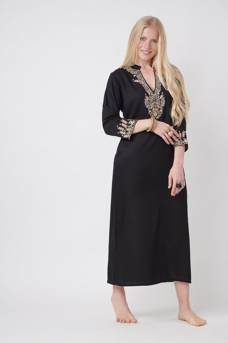 classic evening & parties black gallabia 3/4 sleeves maxi dress 125 cm modern cut with ethnic embroidery twist great & unique embroidery design black gallabia dress with golden bronze embroidery Long Sleeve Kurta For Evening And Eid, Elegant Maxi Dress With Gold Embroidery, Elegant Gold Embroidered Dress For Eid, Gold Embroidered Maxi Length Dresses For Eid, Traditional Evening Maxi Dress For Eid, Eid Maxi Dress With Gold Embroidery, Maxi Length Dresses With Gold Embroidery For Eid, Festive Evening Thobe With Long Sleeves, Black Embroidered Maxi Dress For Eid