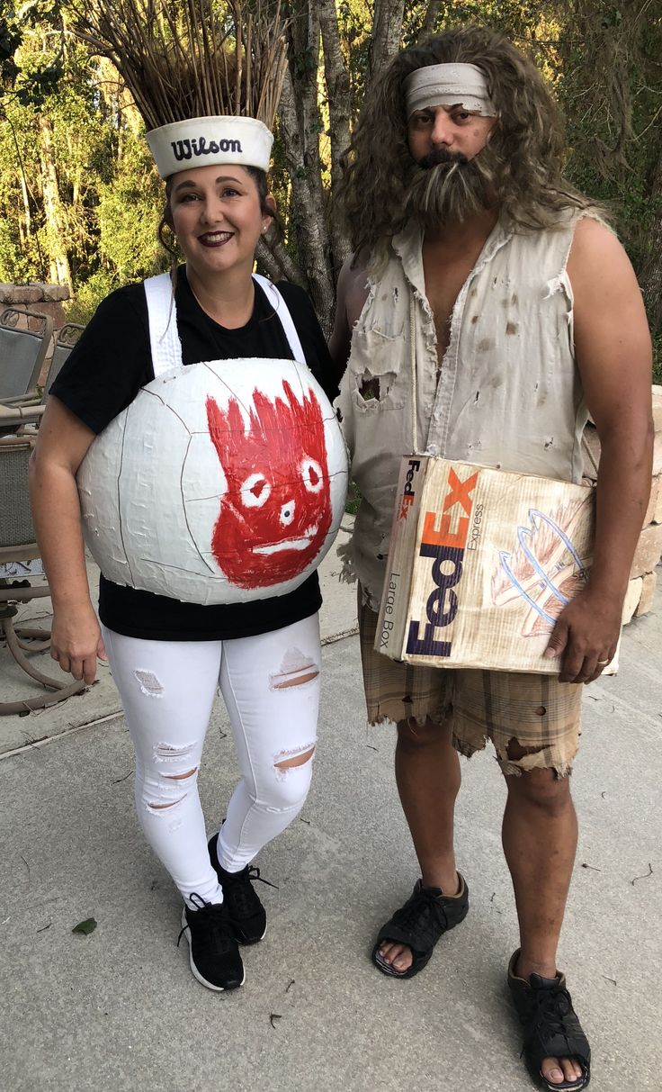 two people in costumes standing next to each other