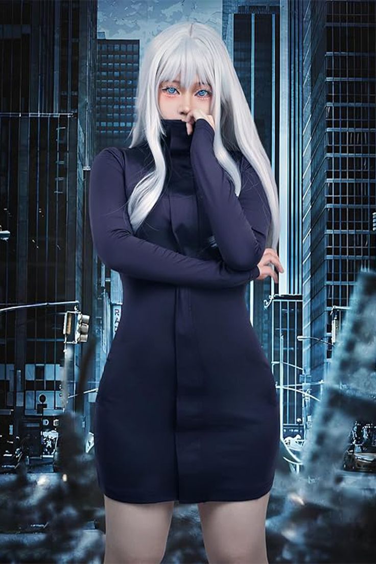 a woman with long white hair standing in front of tall buildings