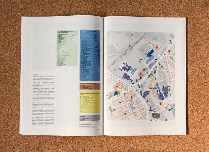 an open book with a map on the page and some information about buildings in it