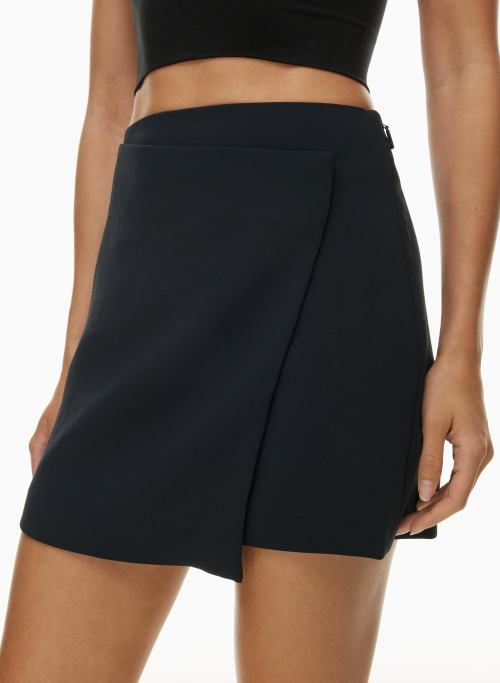 VANILLI SKIRT Elegant Mini Skirt With Built-in Shorts, Elegant Mini Skort With Built-in Shorts, Chic Mini Skirt With Built-in Shorts And Flowy Fit, Chic Solid Skort With Built-in Shorts, Chic Skort With Built-in Shorts, Chic Solid Color Skort With Built-in Shorts, Relaxed Asymmetrical Wrap Skirt For Night Out, Asymmetrical Relaxed Wrap Skirt For Night Out, Elegant Mini Skirt With Asymmetrical Hem For Work