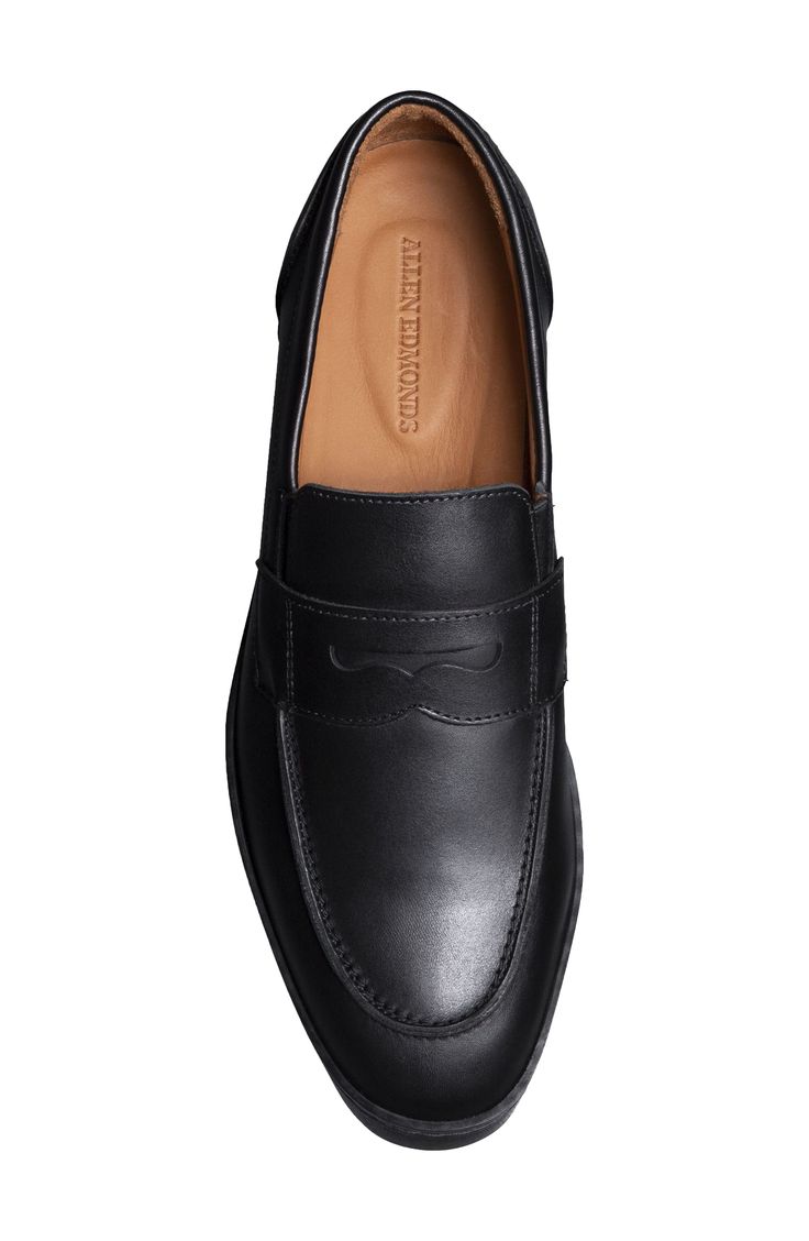 A sleek penny loafer features handsome welted construction and earthy leather for a classic picture. Allen Edmonds has been making shoes in America for nearly 100 years using fine leathers, a 212-step crafting process and 360° Goodyear welt construction to allow for recrafting to extend the life of the shoe. Leather upper, lining and sole Made in the USA Men's Shoes Goodyear Welt Construction Wingtip Moccasins For Work, Office Loafers With Brogue Detailing, Business Moccasins With Brogue Detailing, Masculine Office Loafers With Brogue Detailing, Masculine Business Moccasins With Moc Toe, Classic Brogue Detailed Moccasins For Work, Masculine Brogue Moccasins For Business, Masculine Formal Moccasins With Leather Lining, Masculine Moc Toe Shoes For Workwear